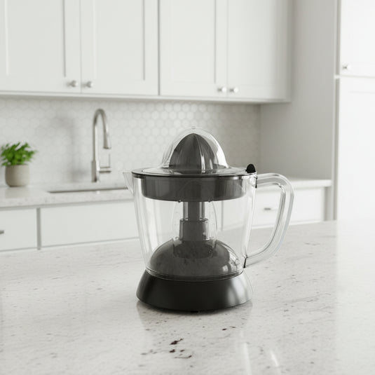 CLEENWOOD CW-577 Electric Citrus Juicer, clear 1-litre capacity jar, showing the rotating reamer cone and the plastic dust cover.