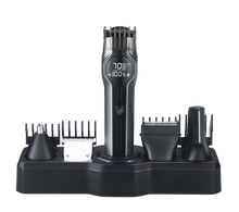 CLEENWOOD CW-874 Super Grooming Kit 14 In 1, showing the main cordless trimmer unit and the full set of fourteen attachments, including the body trimmer, precision trimmer, nose trimmer, and multiple guide combs.