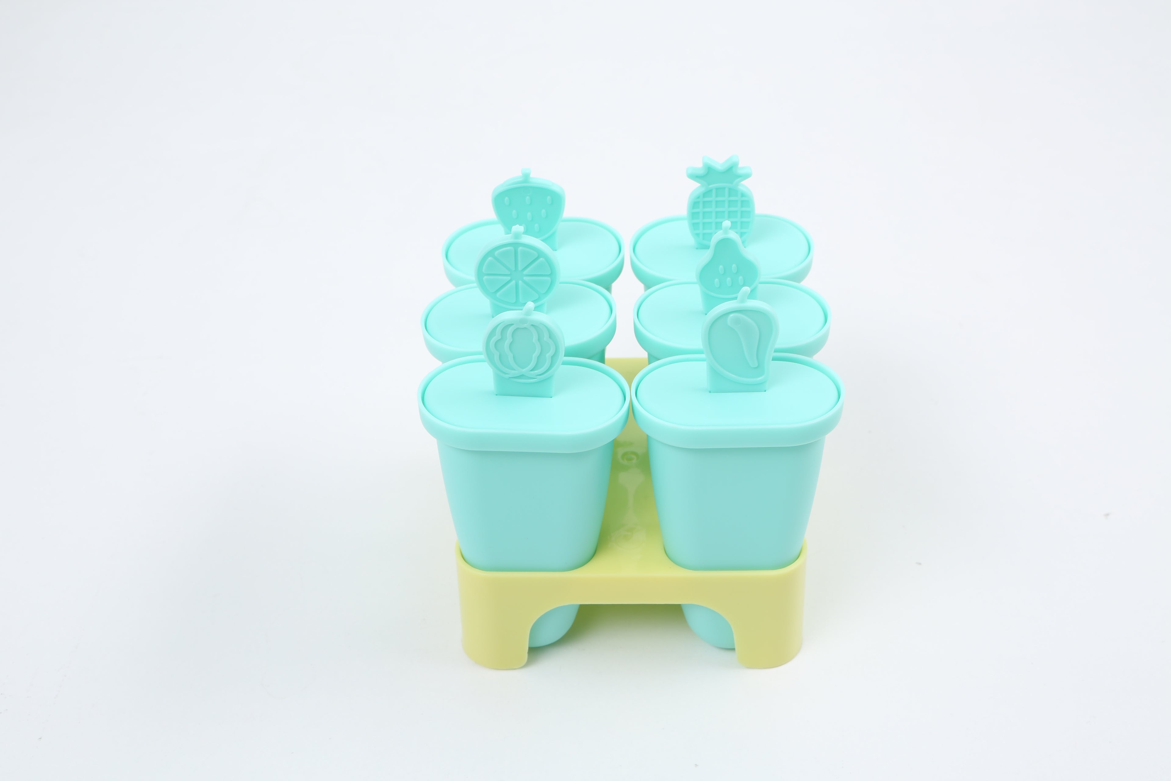 CLEENWOOD CWP-1012 Ice Popsicle Mold, showing the tray base with multiple colorful cavities and the reusable sticks inserted, ready for making homemade frozen juice or yogurt pops.