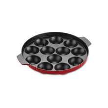 Pigeon Non-Stick Paniyarakkal 12 Rounds (Appam Patra) on an induction cooktop, making appams.